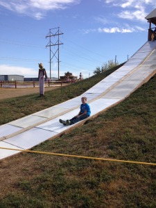 Boo smiling as he slides